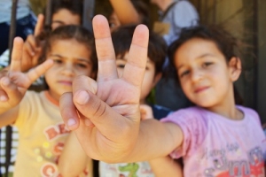 Syrian Refugee Peace Sign