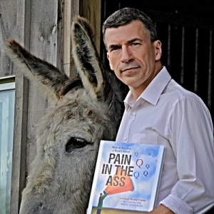 Dr. Christopher DiCarlo seen with his book