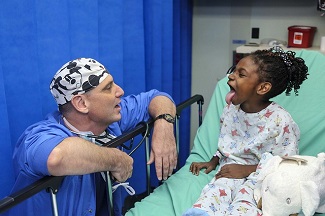 Doctor with Pediatric Patient